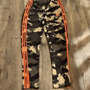 Adidas camouflage and orange joggers
